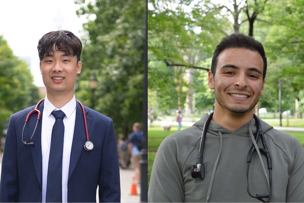 Medical students smiling with stethoscopes around their shoulders