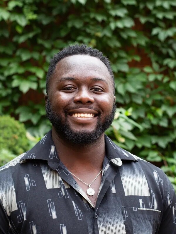 A person smiling for a picture