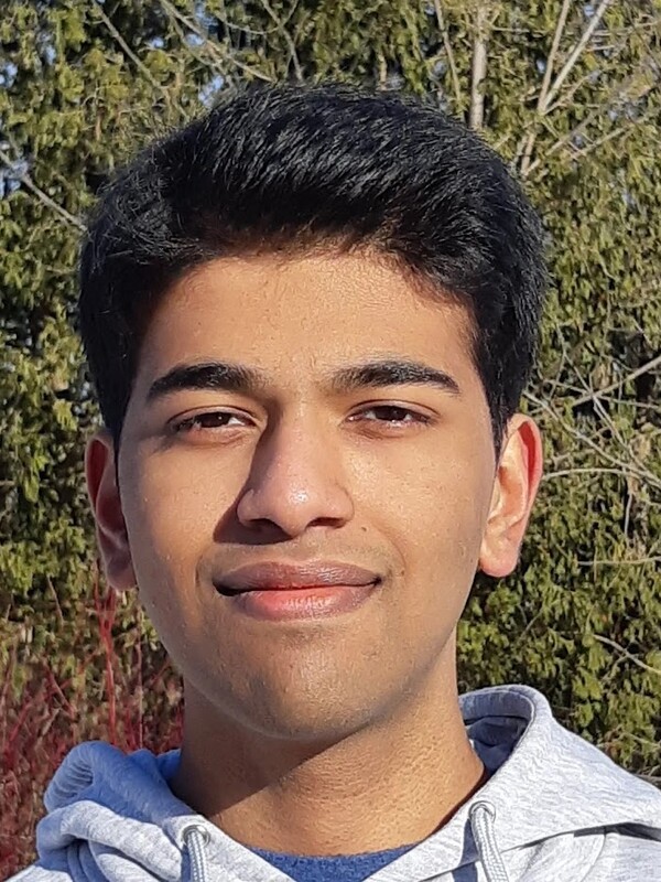 A person smiling for a picture