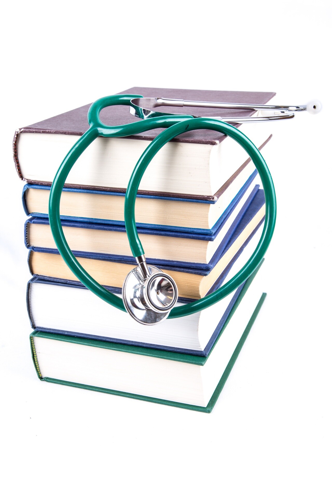 Books and stethoscope.